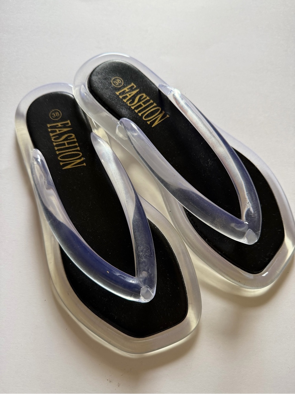 Clear Jelly Flip Flops - Black Footbed